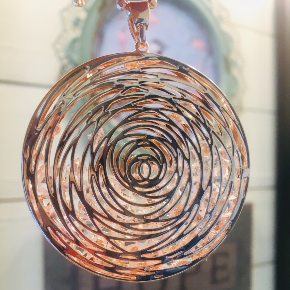 Statement necklace - rose gold swirl with crystals